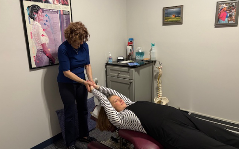 Dr. Honi giving prenatal chiropractic care