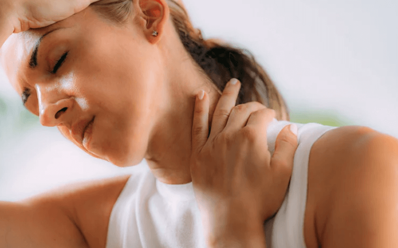 Woman with neck pain and headache relief