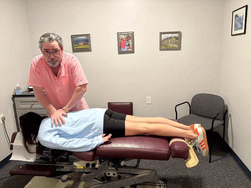Dr. Sandy treating neck pain, Billerica MA